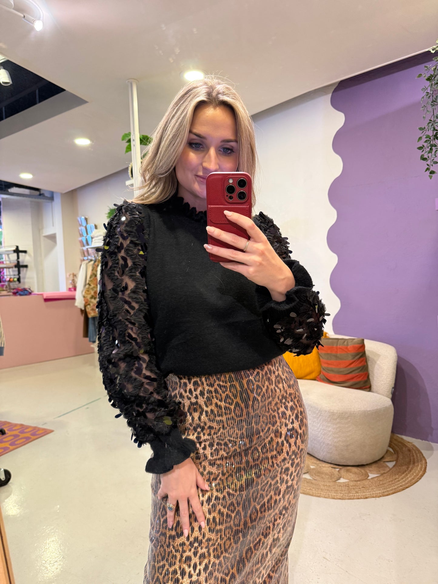 Zwarte trui met glitter blouse mouwen