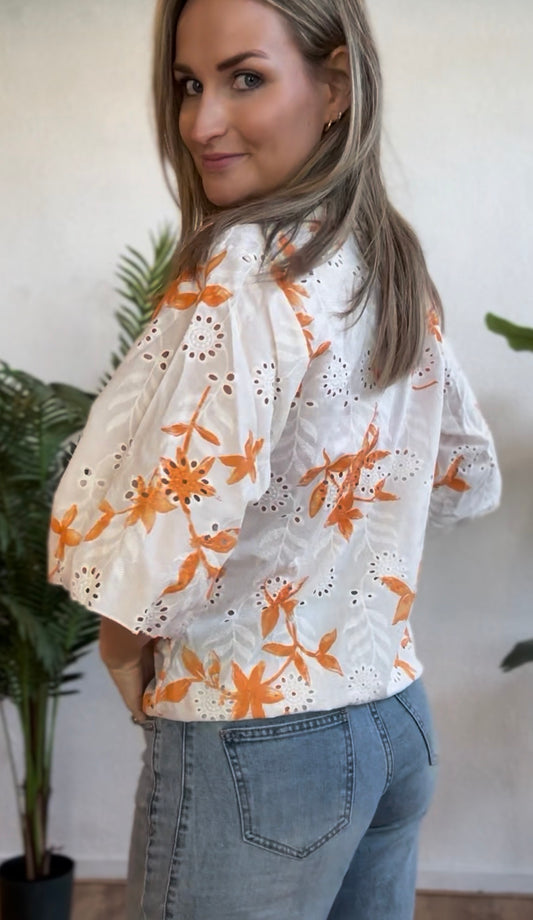 Blouse oranje print korte mouw