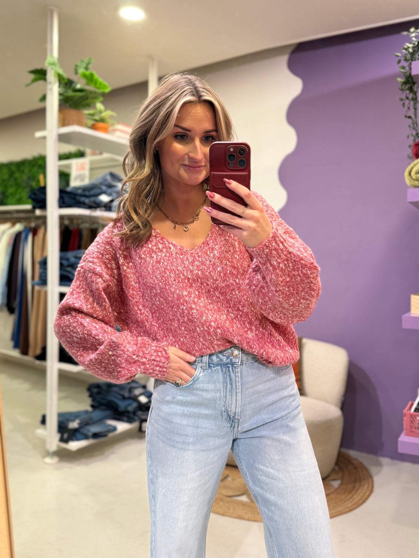 Roze trui met v-hals