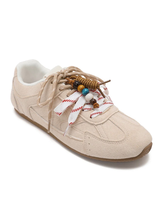 Beige sneaker suede look met kralen