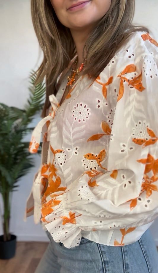 Blouse oranje print lange mouw