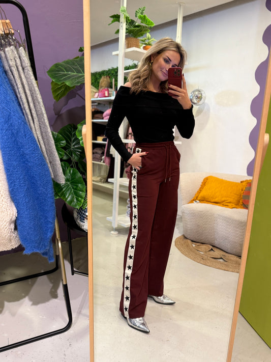Sporty bordeaux broek met sterren bies