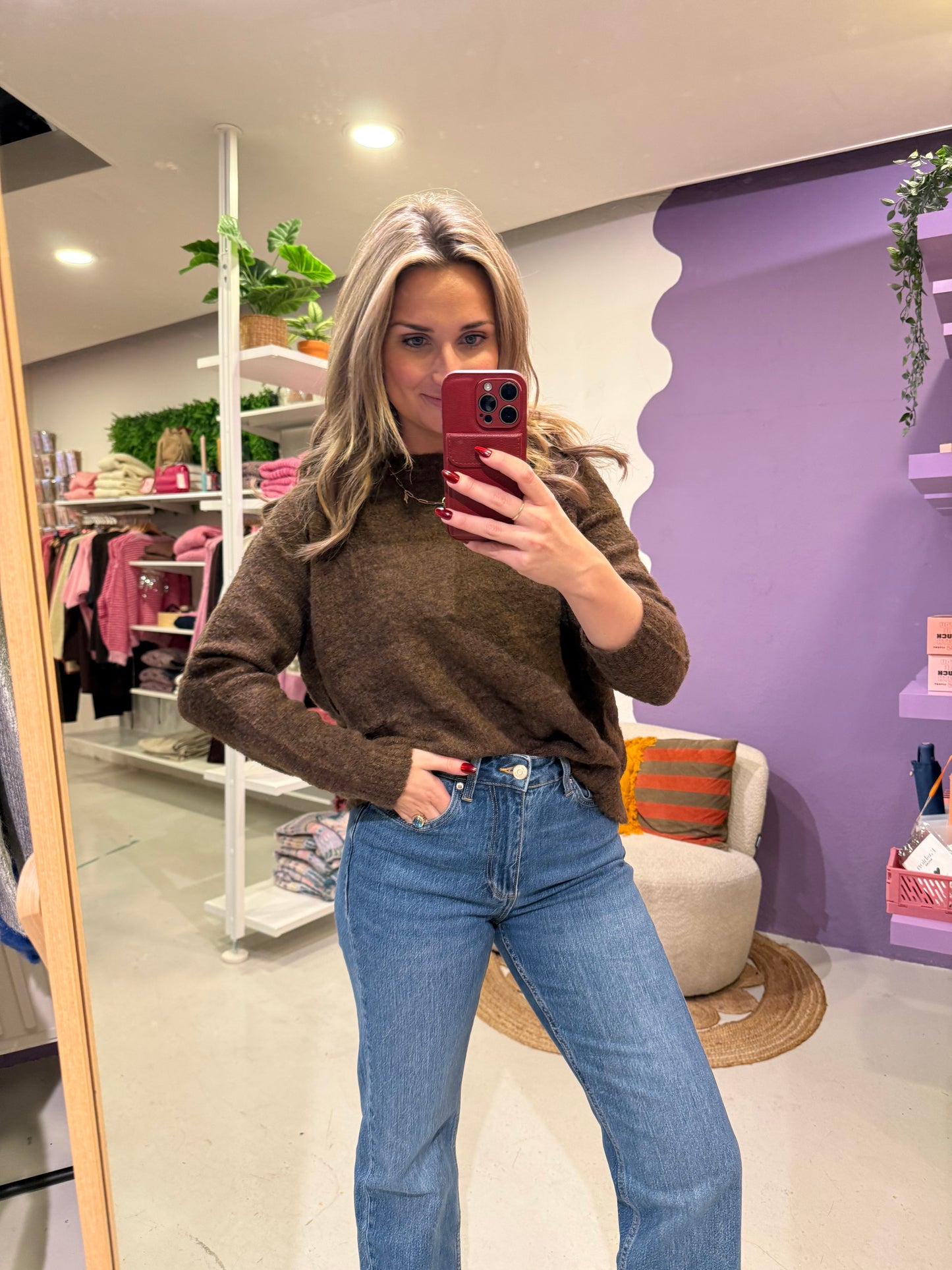 Bruine trui met strik detail op de rug