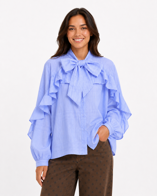 Blauwe blouse ruffle en strik