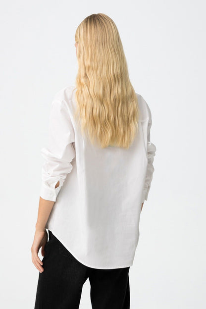 Witte relaxed fit blouse met studs