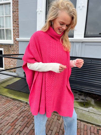 Gebreide Poncho met col koraal