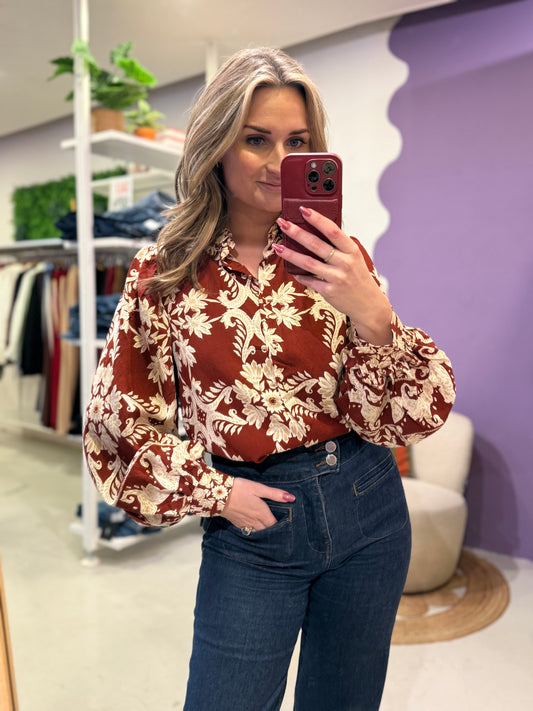 Blouse bordeaux met print en ballonmouw