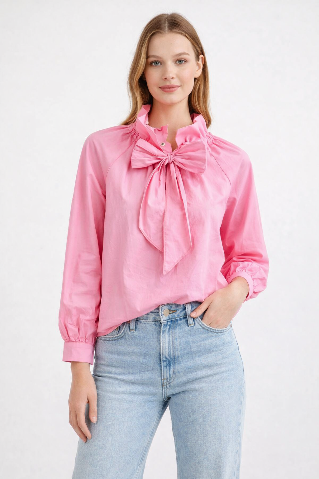 Roze blouse met strik