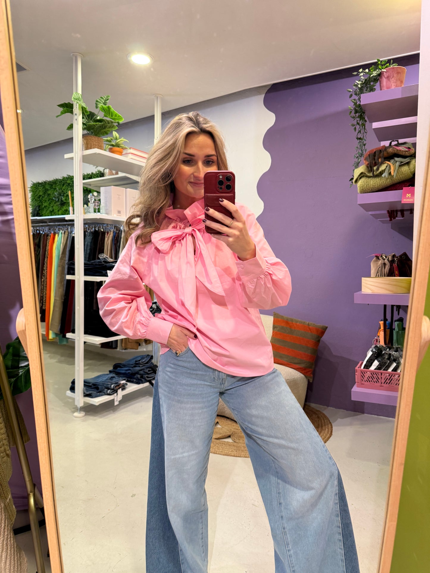 Roze blouse met strik