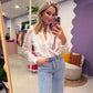 Witte ruffle blouse met borduursel