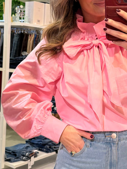 Roze blouse met strik