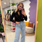 Zwarte blouse met borduursel