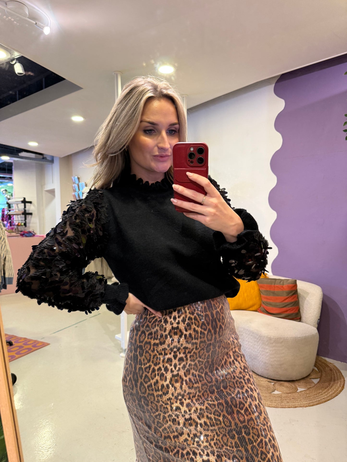 Zwarte trui met glitter blouse mouwen
