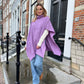 Gebreide Poncho met col lila