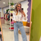 Witte ruffle blouse met borduursel