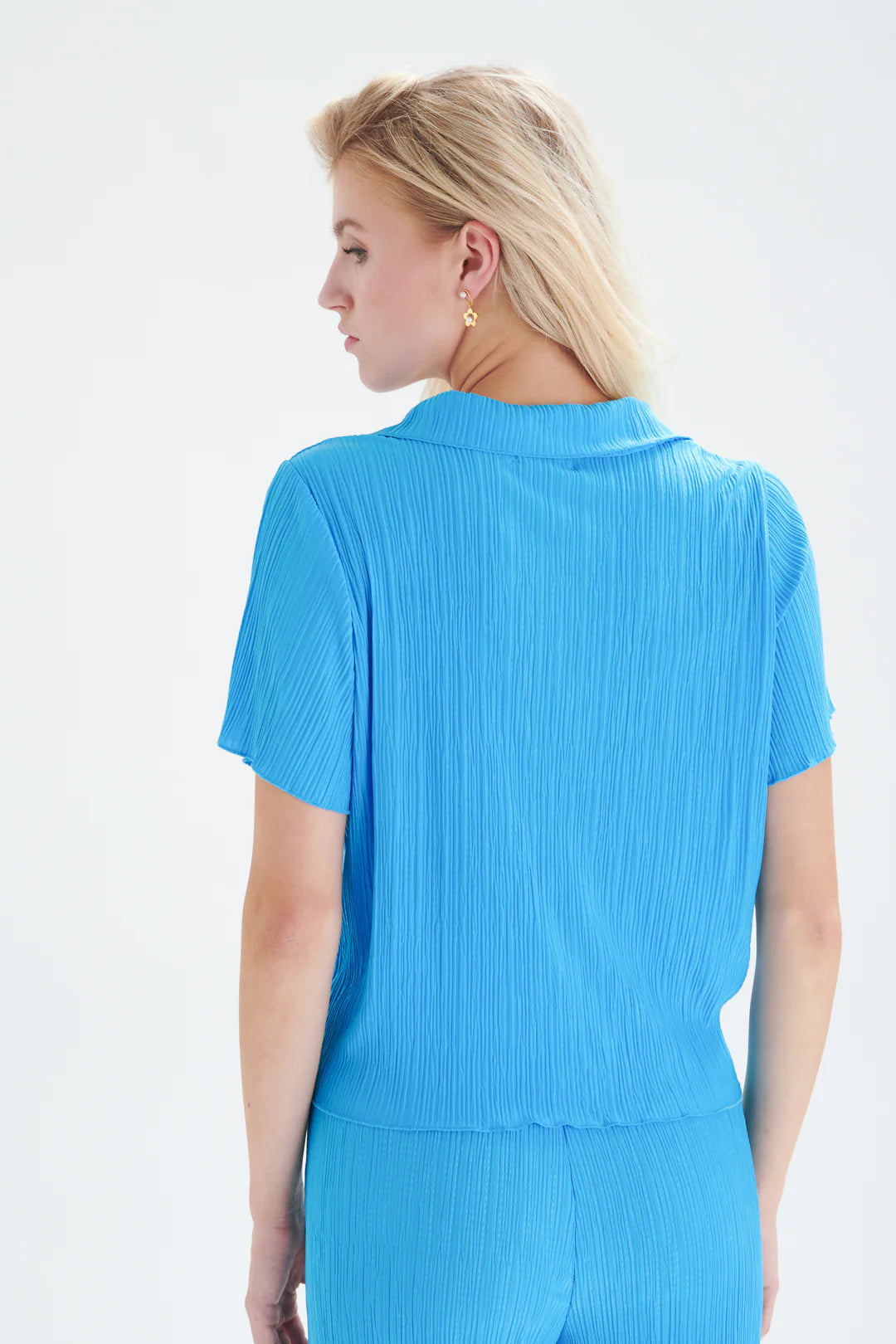 Blauwe plissé blouse