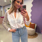 Witte ruffle blouse met borduursel
