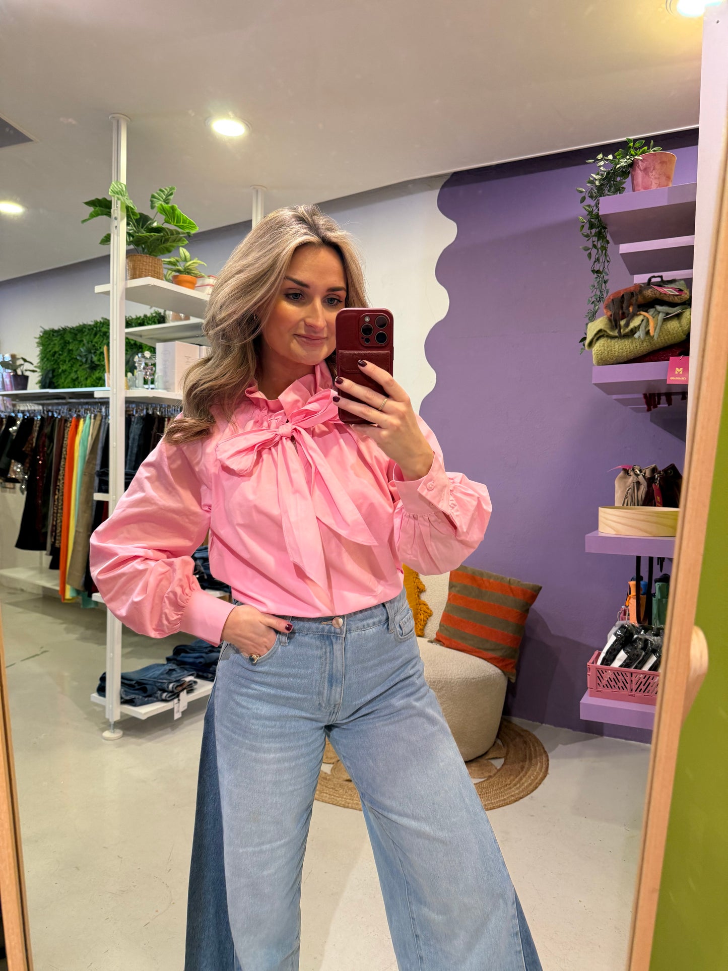 Roze blouse met strik